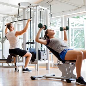 couple working out at fitness center