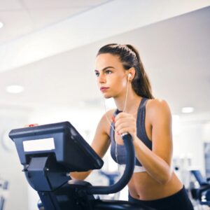 Woman using an elliptical trainer