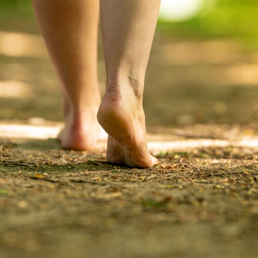 person walking on trail
