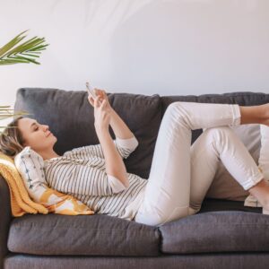 woman relaxing on couch