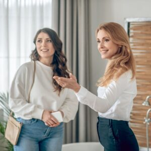 leasing agent and tenant in apartment