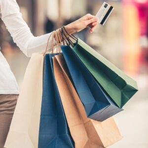 woman holding shopping bags