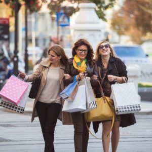 woman walking with shopping bags