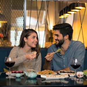 a couple eating at a restaurant
