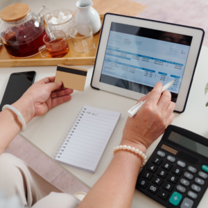 Person looking at a bill. 