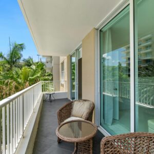 apartment balcony with chairs and table