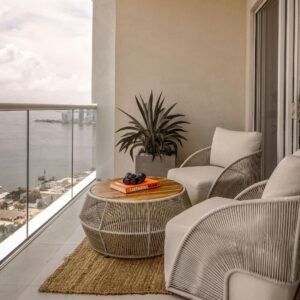 balcony furniture and a plant