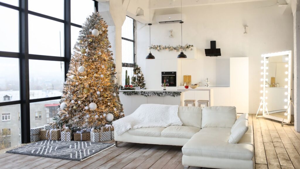 christmas tree in living room with white couch