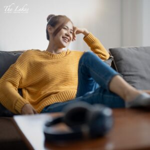 woman relaxing in her appartment