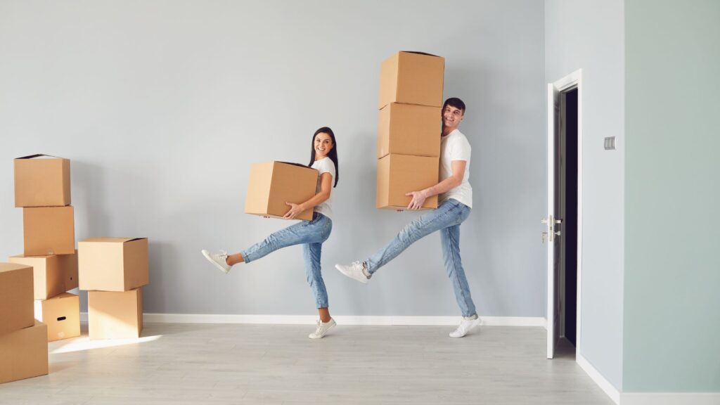 happy couple unpacking