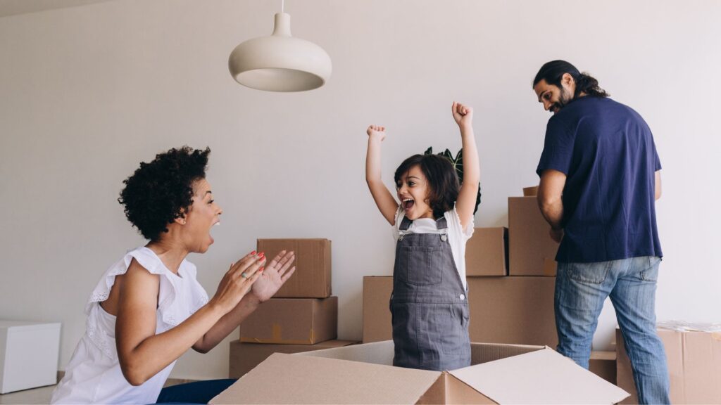 happy family unpacking